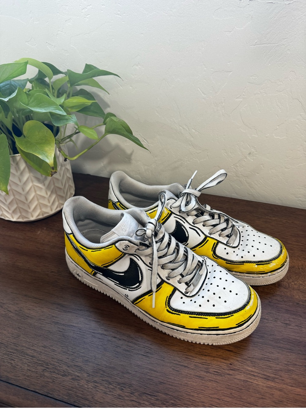 Nike Air Force 1 Cartoon White and Yellow Men's Sneakers with Black Accent